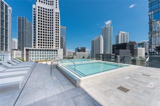 view of swimming pool featuring a patio