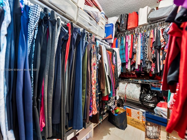 walk in closet featuring tile patterned floors