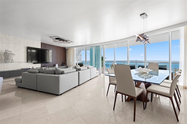 living room with floor to ceiling windows