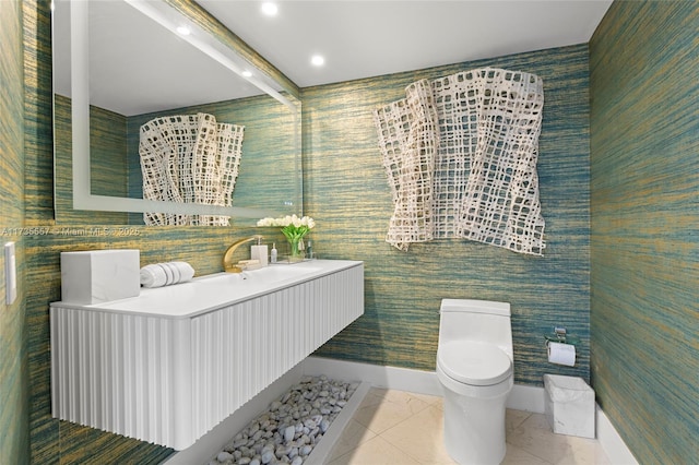 bathroom featuring sink, beam ceiling, and toilet