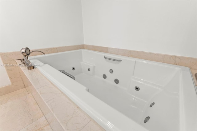 bathroom featuring a relaxing tiled tub