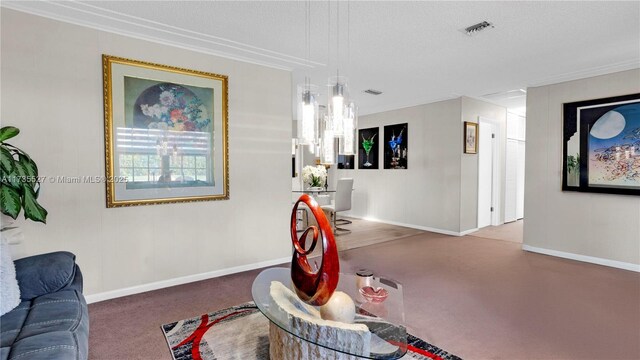 dining area with ornamental molding, carpet flooring, and a textured ceiling