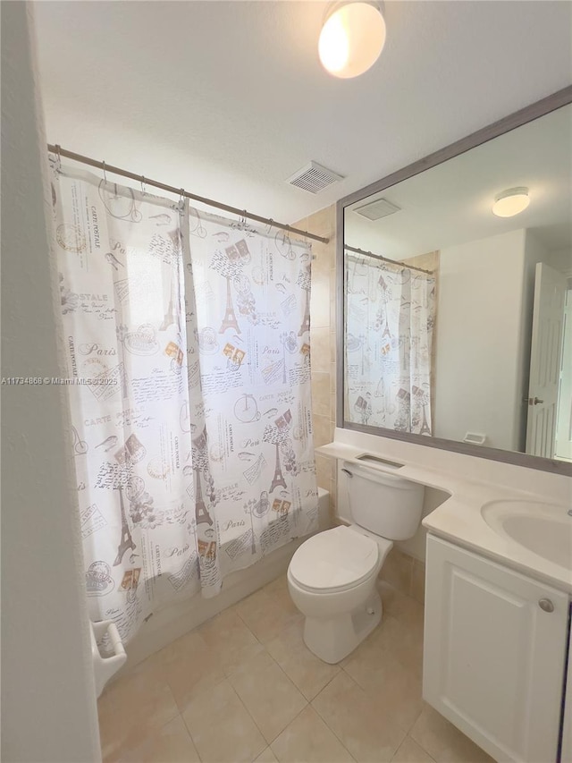 full bathroom featuring tile patterned flooring, shower / bath combo, vanity, and toilet