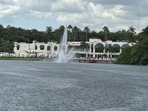 surrounding community with a water view