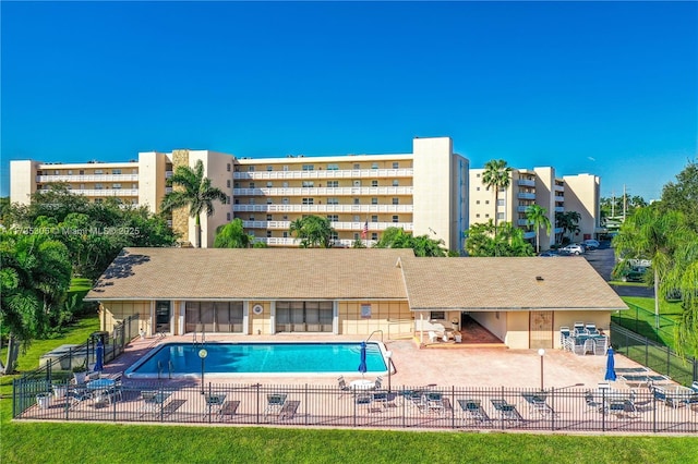 view of swimming pool with a patio area