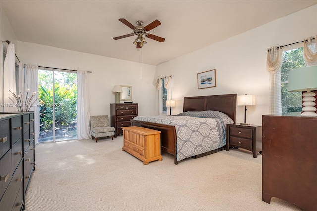 bedroom featuring ceiling fan, access to outside, and light carpet