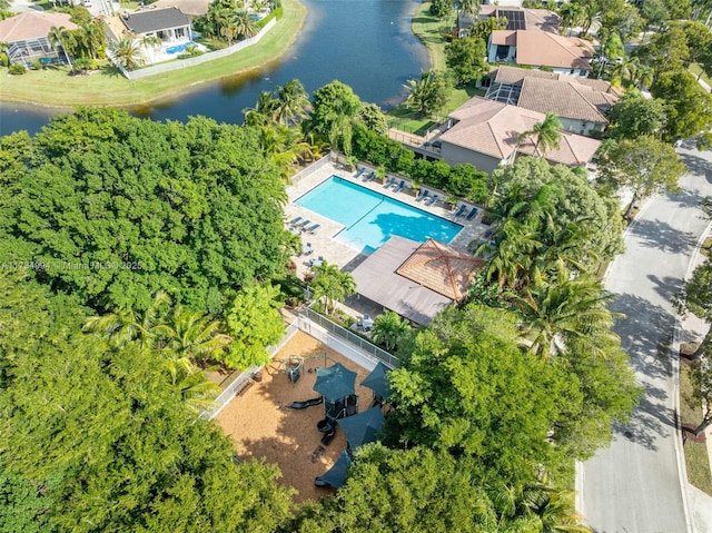 birds eye view of property featuring a water view and a residential view