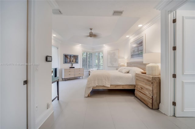 tiled bedroom with a raised ceiling, ornamental molding, and ceiling fan