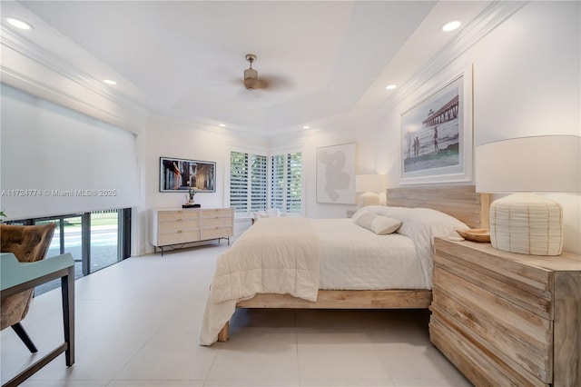 tiled bedroom with multiple windows, crown molding, and a raised ceiling