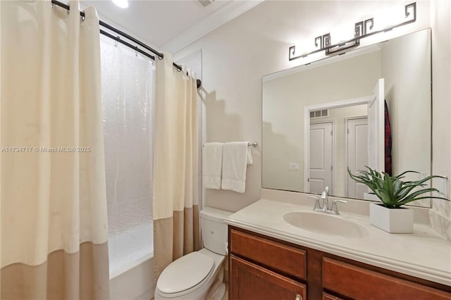 full bathroom featuring vanity, crown molding, toilet, and shower / bath combo with shower curtain