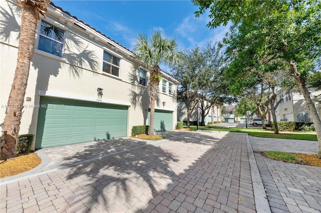 exterior space with a garage