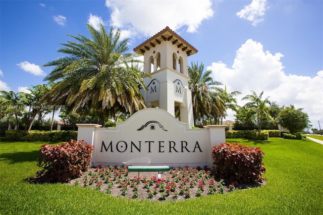 community sign with a lawn