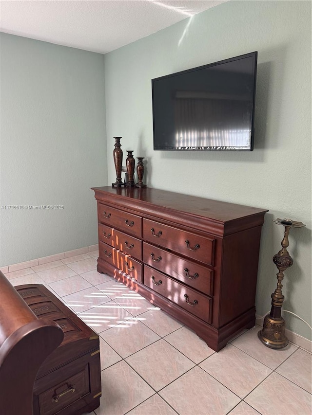 interior space featuring baseboards