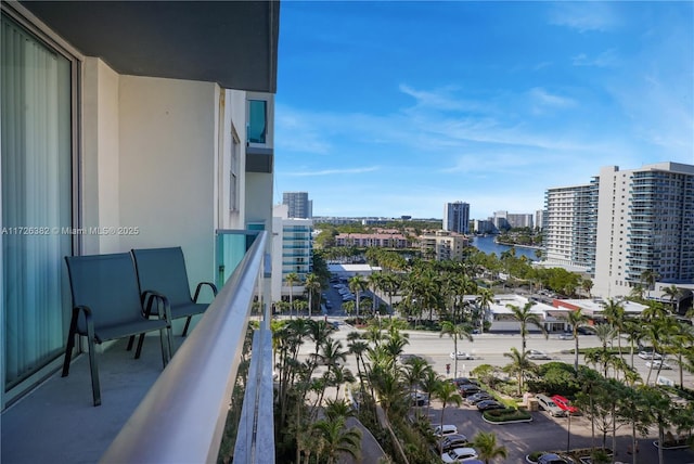 balcony featuring a water view