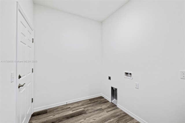 laundry area featuring hookup for a washing machine, hardwood / wood-style floors, and electric dryer hookup