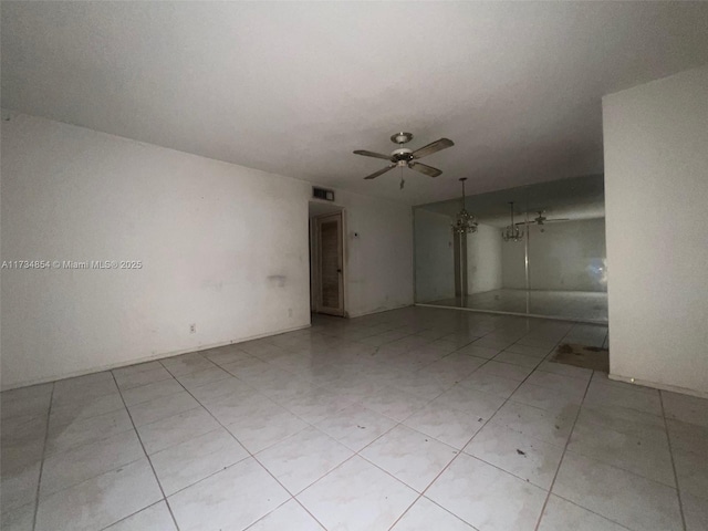 unfurnished room featuring ceiling fan