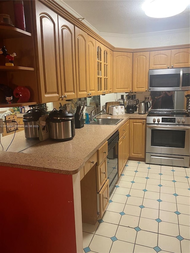 kitchen with ornamental molding, appliances with stainless steel finishes, and sink