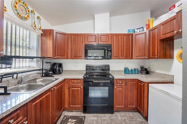 kitchen featuring lofted ceiling, sink, black appliances, and a textured ceiling