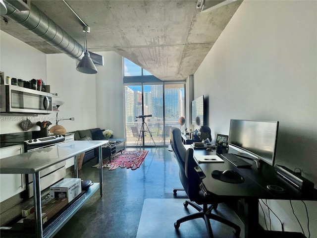 office space featuring expansive windows