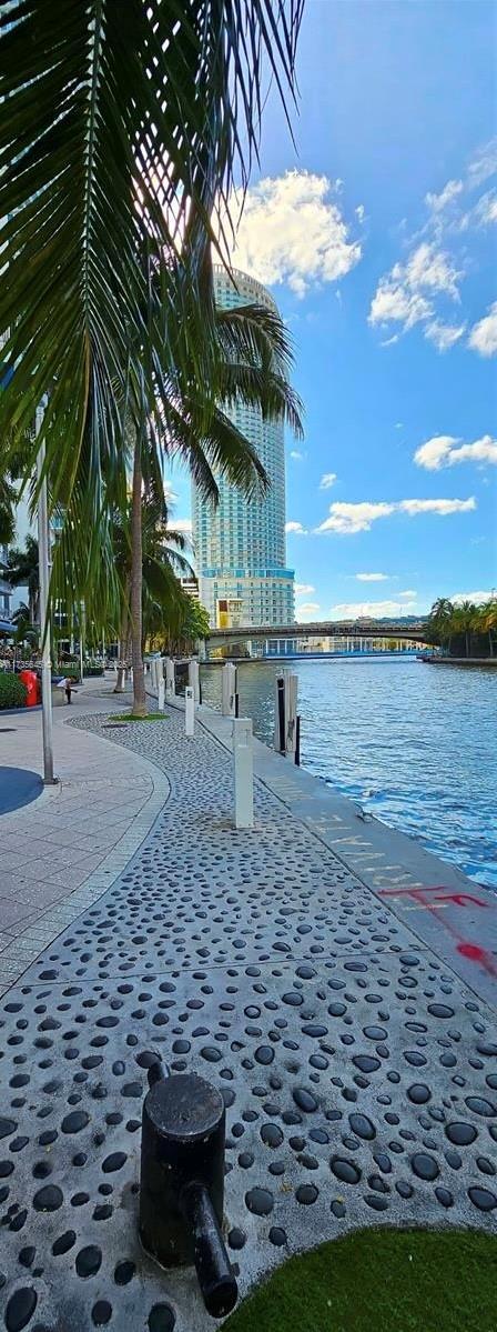 view of home's community with a water view