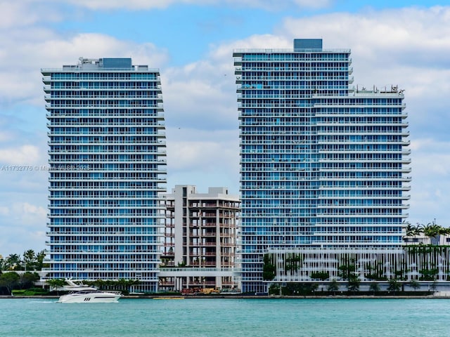 view of building exterior with a water view