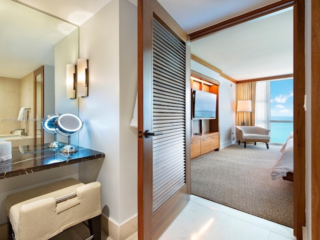 bathroom with ornamental molding