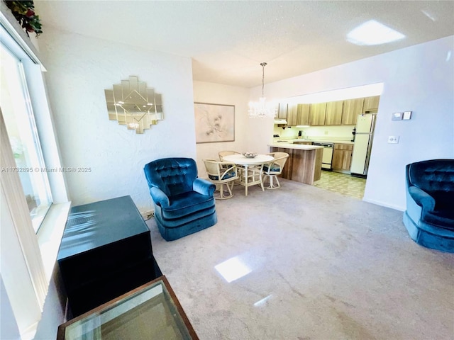 living room featuring light carpet and plenty of natural light