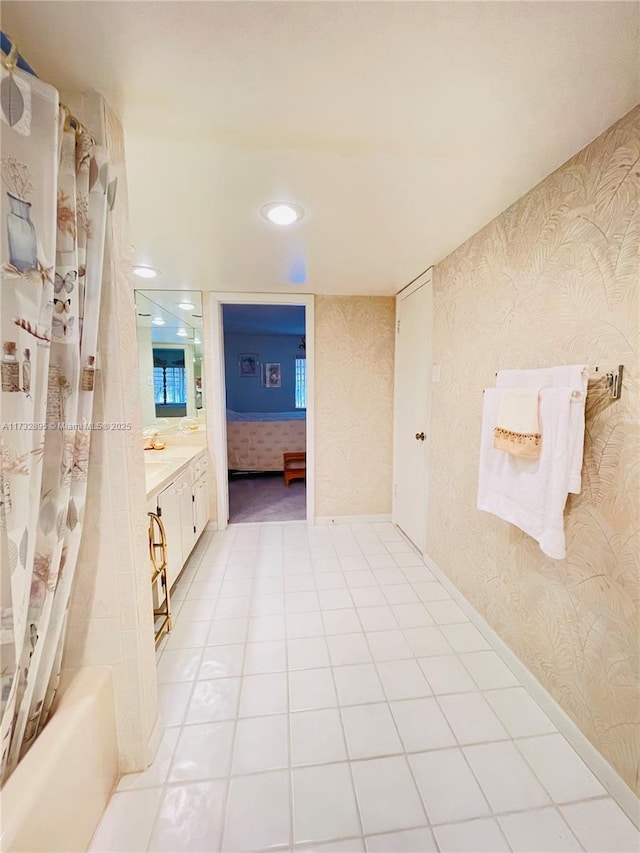 bathroom with shower / bath combination with curtain and vanity