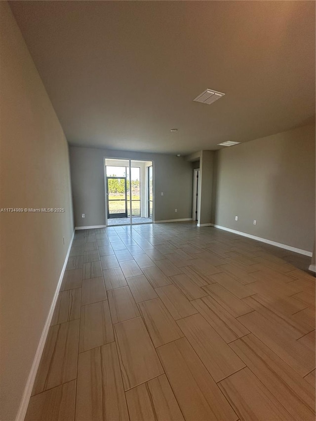 empty room with light wood-type flooring