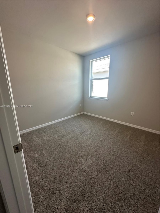 unfurnished room featuring carpet floors