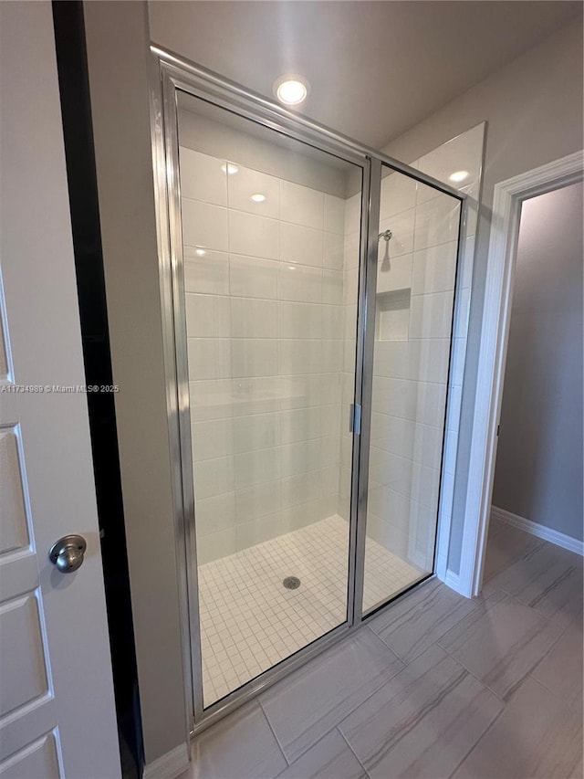 bathroom featuring walk in shower