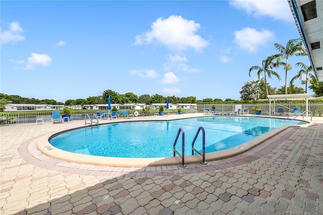 view of pool featuring a patio area