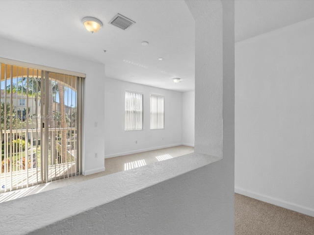 view of carpeted empty room