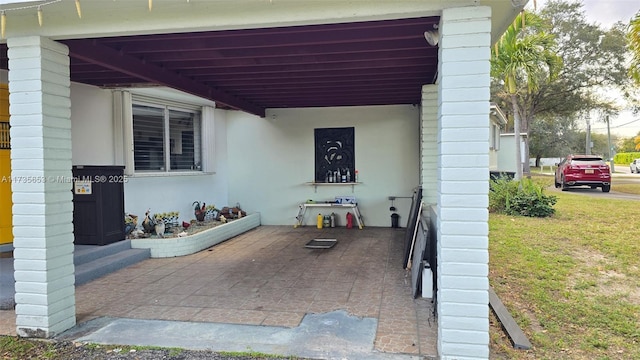 view of patio / terrace with a carport