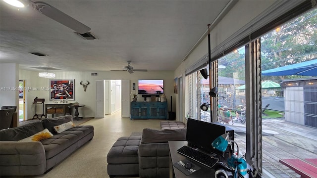 living room with ceiling fan