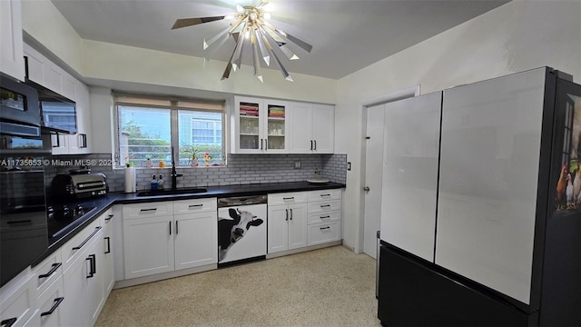 kitchen with white dishwasher, sink, white cabinetry, and tasteful backsplash