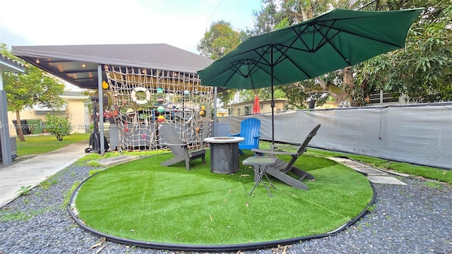 view of jungle gym featuring a yard