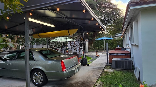 view of parking / parking lot featuring a carport