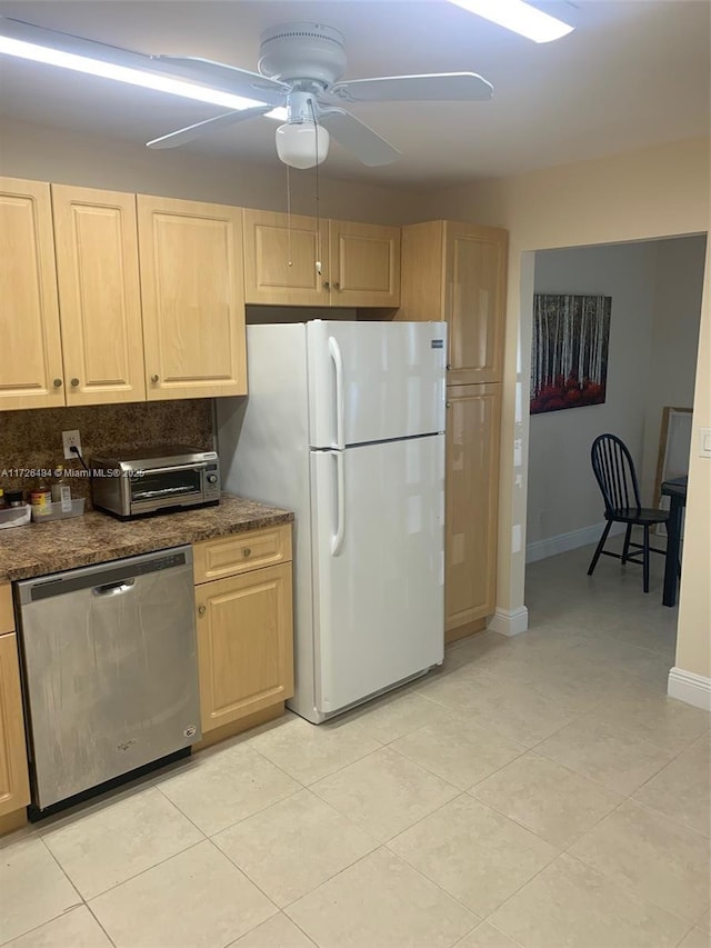 kitchen with dishwasher, backsplash, white fridge, ceiling fan, and light brown cabinets