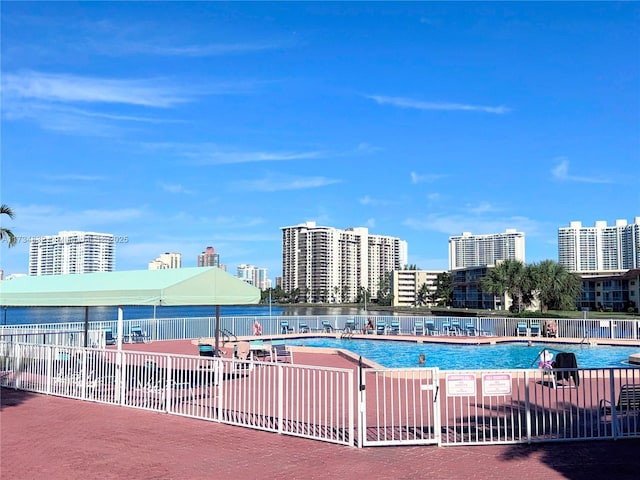 view of swimming pool with a patio