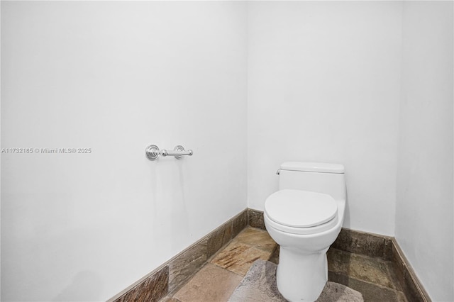 bathroom featuring toilet