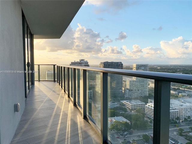 view of balcony at dusk