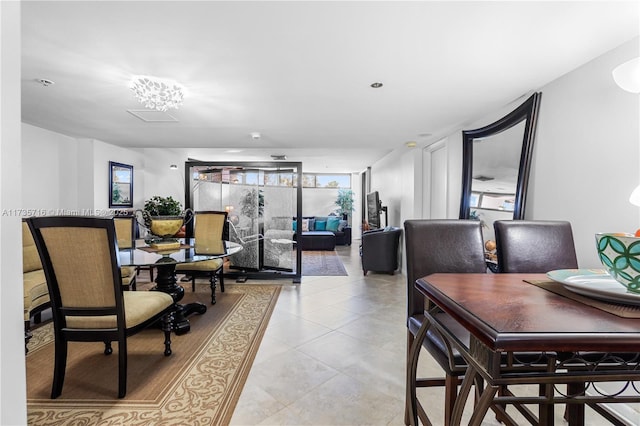 dining space with light tile patterned floors