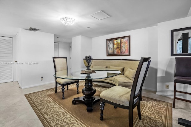 tiled dining space with breakfast area