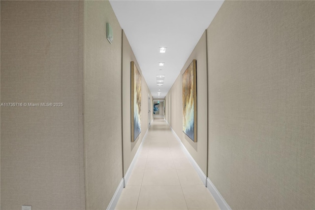 hallway featuring light tile patterned floors