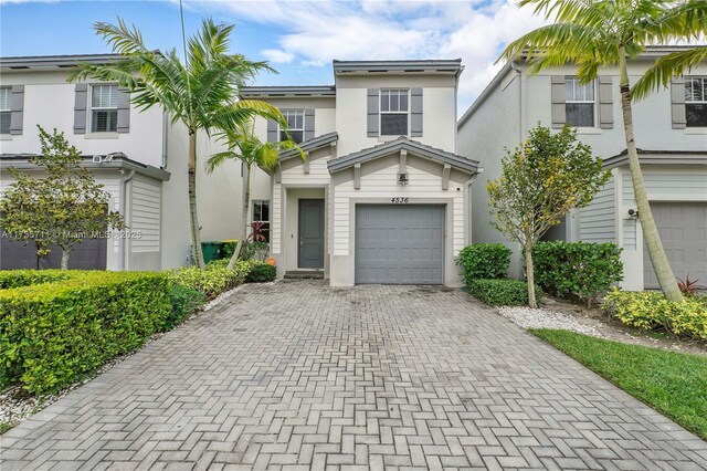 view of front of property featuring a garage