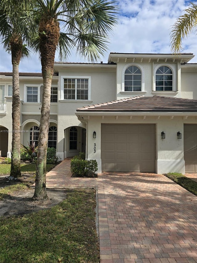 view of front of property with a garage