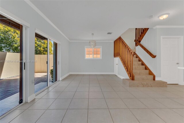 tiled empty room with ornamental molding