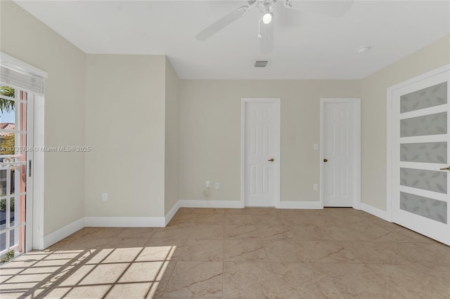 spare room featuring ceiling fan