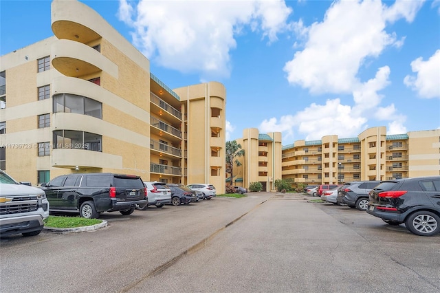 6575 W Oakland Park Blvd Unit 114, Lauderhill, FL 33313 - view of apartment building / complex featuring uncovered parking